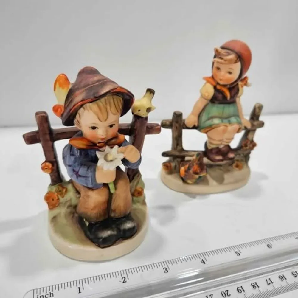 Vintage Hummel Boy and Girl Figurines on Fence